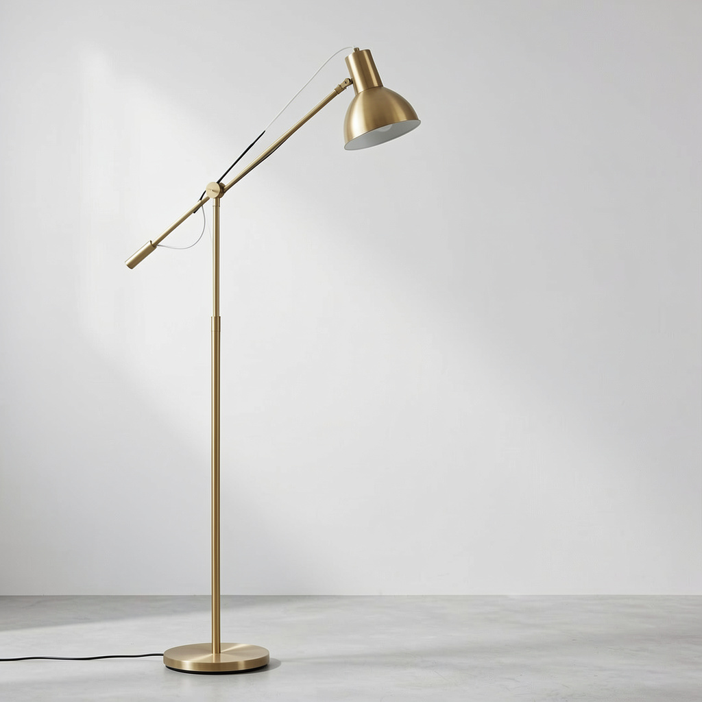 Modern brushed brass floor lamp with adjustable arm